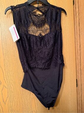 NWT From Amazon black bodysuit fits 4-6, 8-10, 12-14, and 16-18